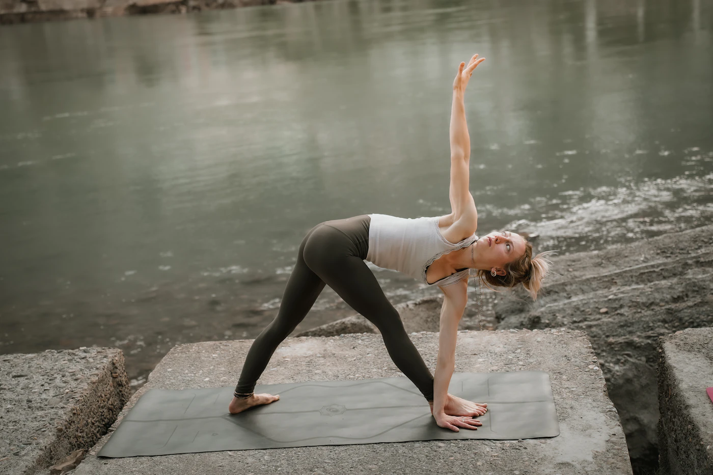 A group practising mindful Hatha Yoga together in a calm studio setting